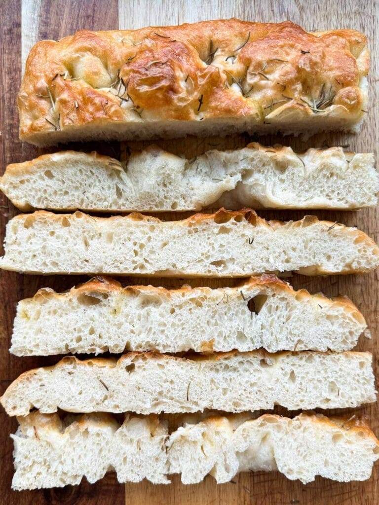 Sliced focaccia with a titile that says Beginner Bread Recipes.